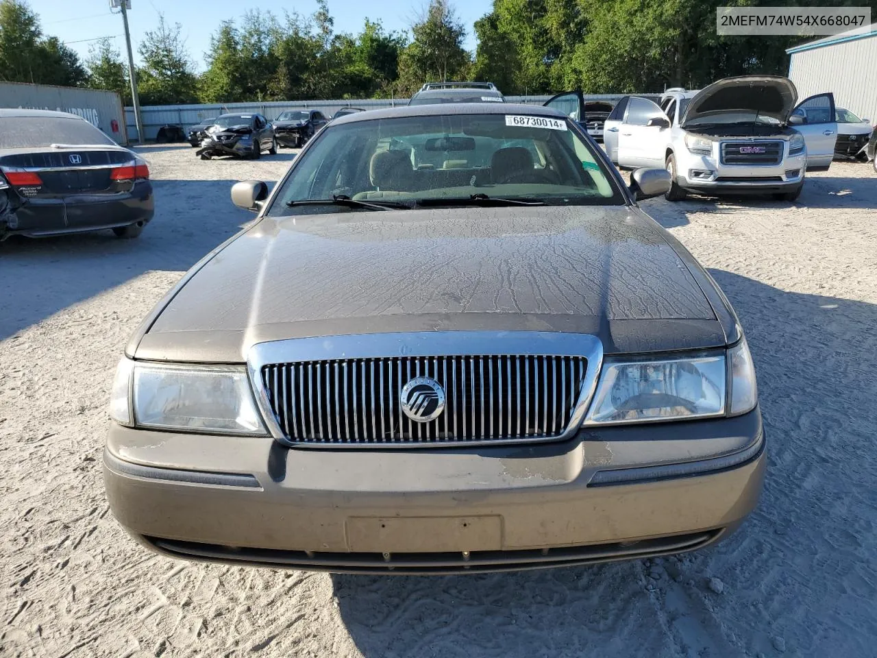 2004 Mercury Grand Marquis Gs VIN: 2MEFM74W54X668047 Lot: 68730014