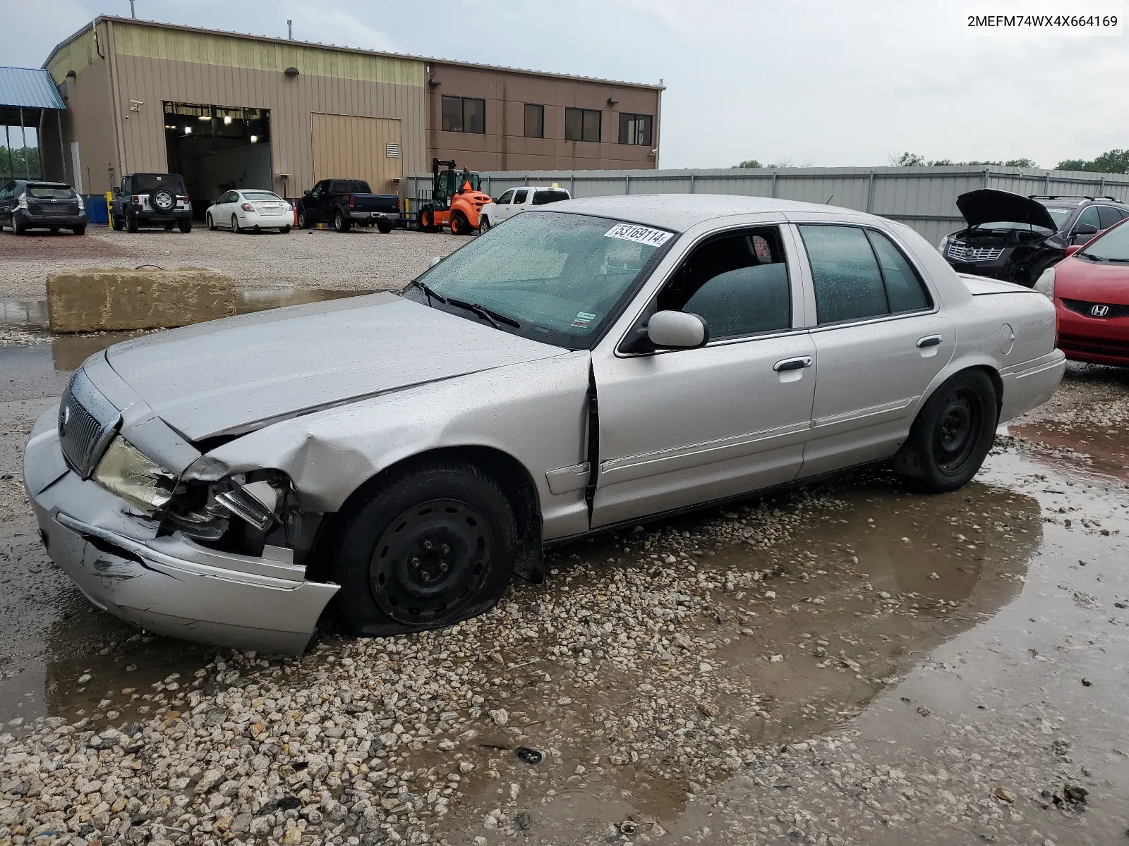 2004 Mercury Grand Marquis Gs VIN: 2MEFM74WX4X664169 Lot: 68802734