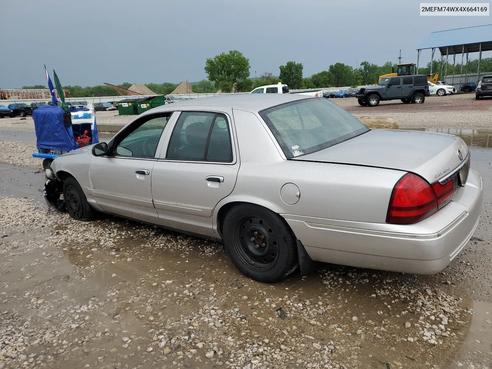 2004 Mercury Grand Marquis Gs VIN: 2MEFM74WX4X664169 Lot: 68802734