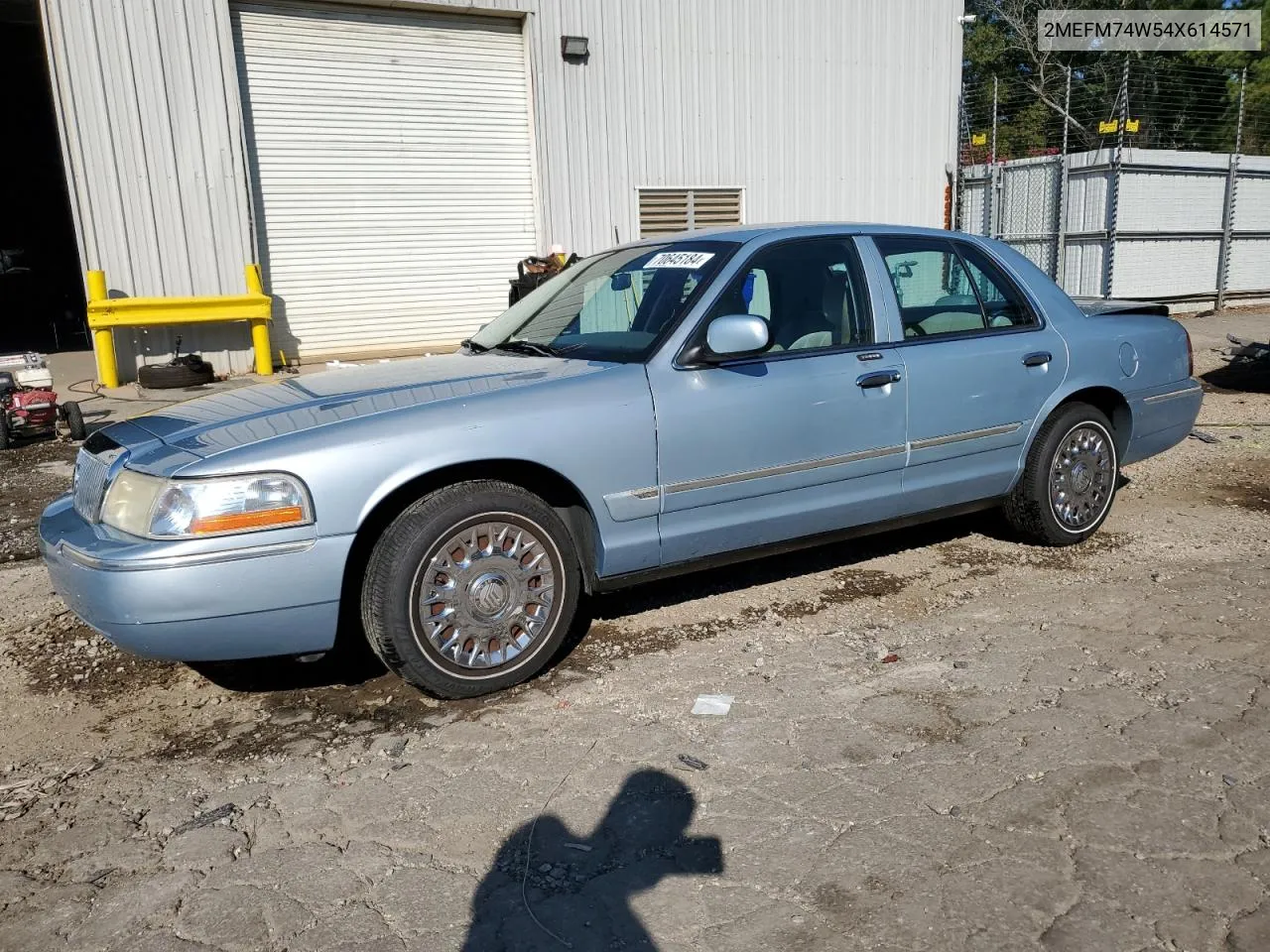 2004 Mercury Grand Marquis Gs VIN: 2MEFM74W54X614571 Lot: 70645184