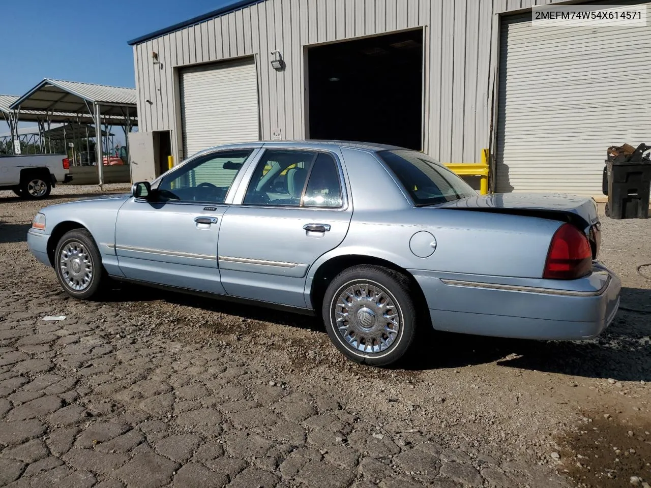 2004 Mercury Grand Marquis Gs VIN: 2MEFM74W54X614571 Lot: 70645184