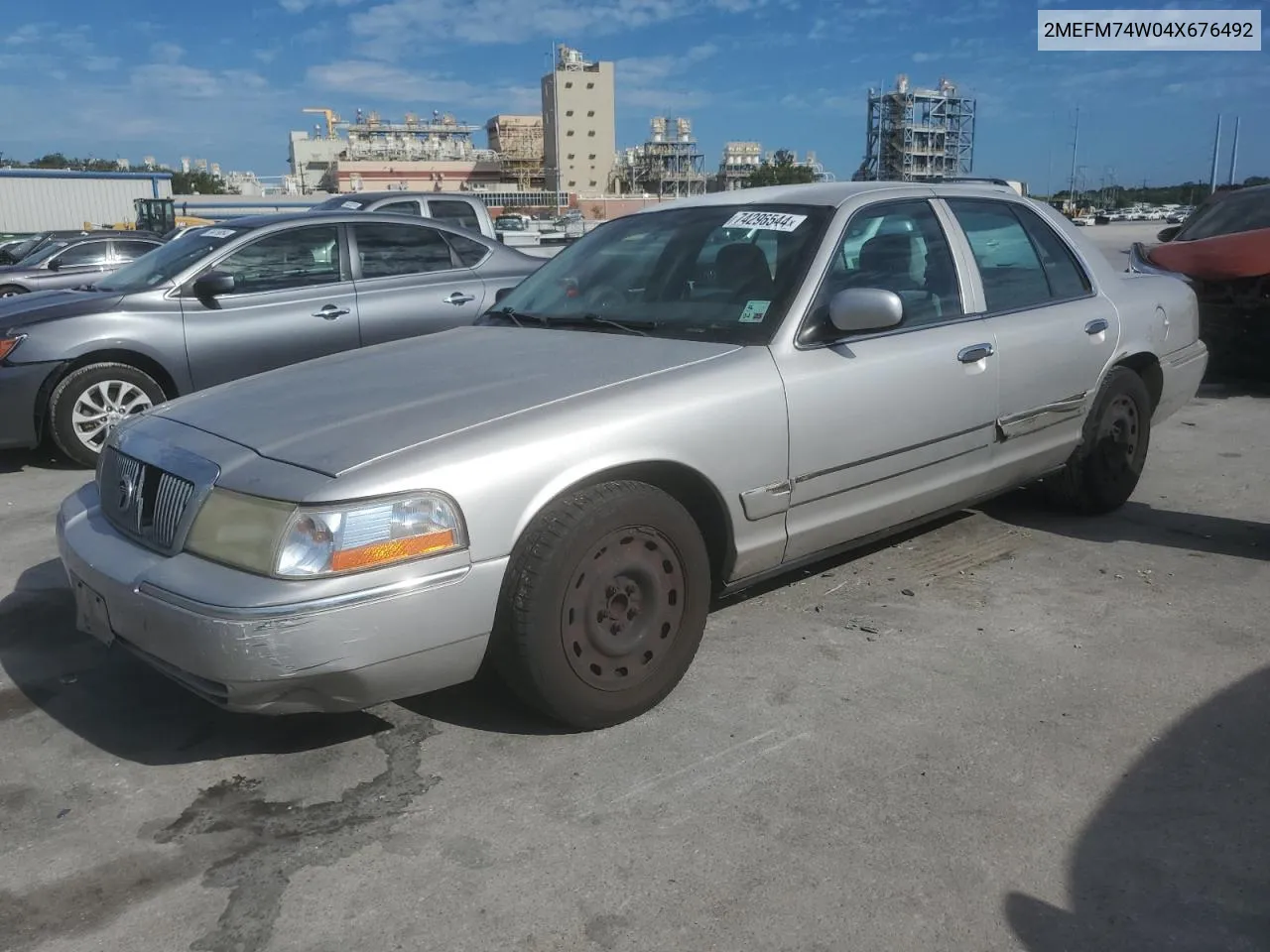 2004 Mercury Grand Marquis Gs VIN: 2MEFM74W04X676492 Lot: 74296544