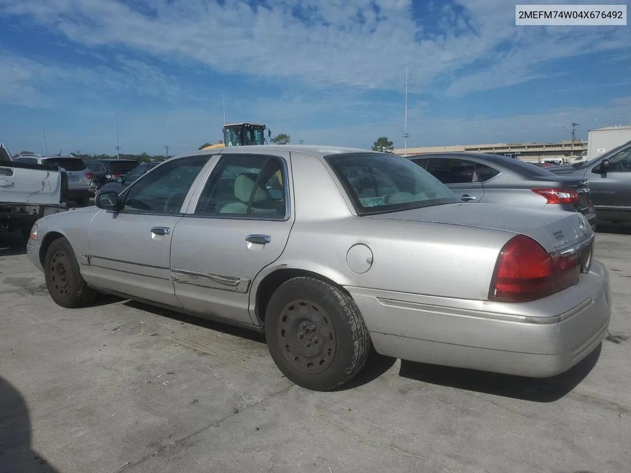 2004 Mercury Grand Marquis Gs VIN: 2MEFM74W04X676492 Lot: 74296544