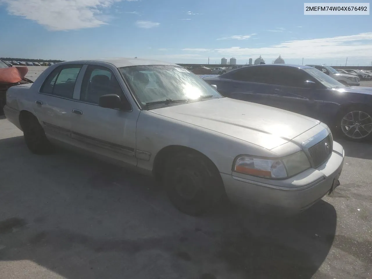 2004 Mercury Grand Marquis Gs VIN: 2MEFM74W04X676492 Lot: 74296544