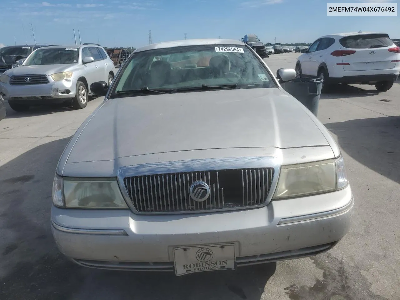 2004 Mercury Grand Marquis Gs VIN: 2MEFM74W04X676492 Lot: 74296544