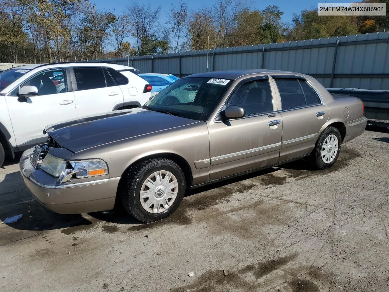 2004 Mercury Grand Marquis Gs VIN: 2MEFM74W34X686904 Lot: 76692064