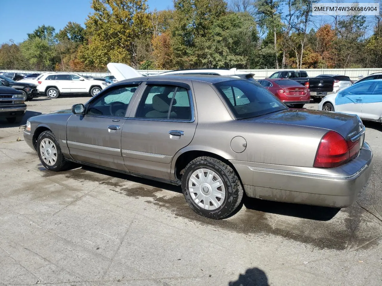 2004 Mercury Grand Marquis Gs VIN: 2MEFM74W34X686904 Lot: 76692064