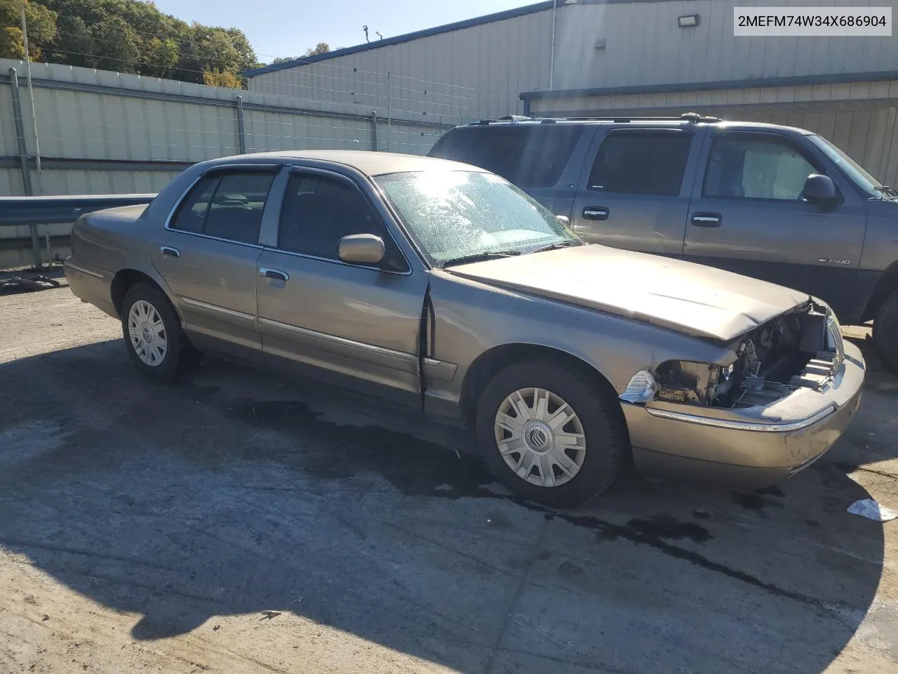 2004 Mercury Grand Marquis Gs VIN: 2MEFM74W34X686904 Lot: 76692064