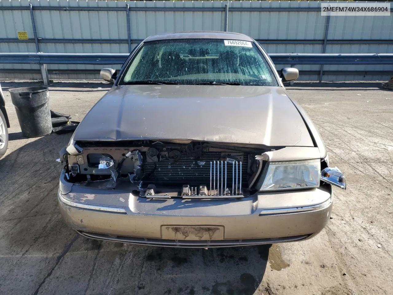 2004 Mercury Grand Marquis Gs VIN: 2MEFM74W34X686904 Lot: 76692064