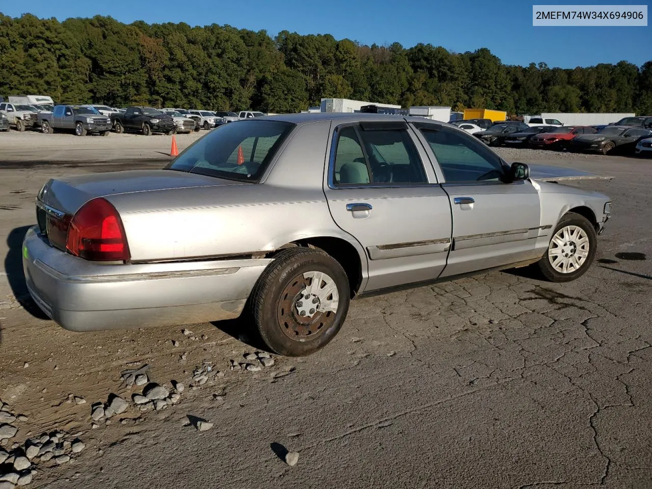 2004 Mercury Grand Marquis Gs VIN: 2MEFM74W34X694906 Lot: 77219244