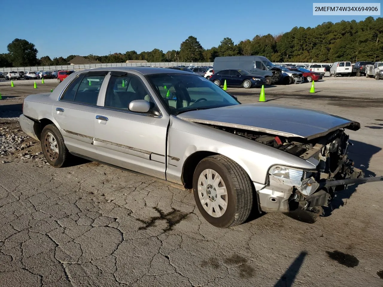 2004 Mercury Grand Marquis Gs VIN: 2MEFM74W34X694906 Lot: 77219244