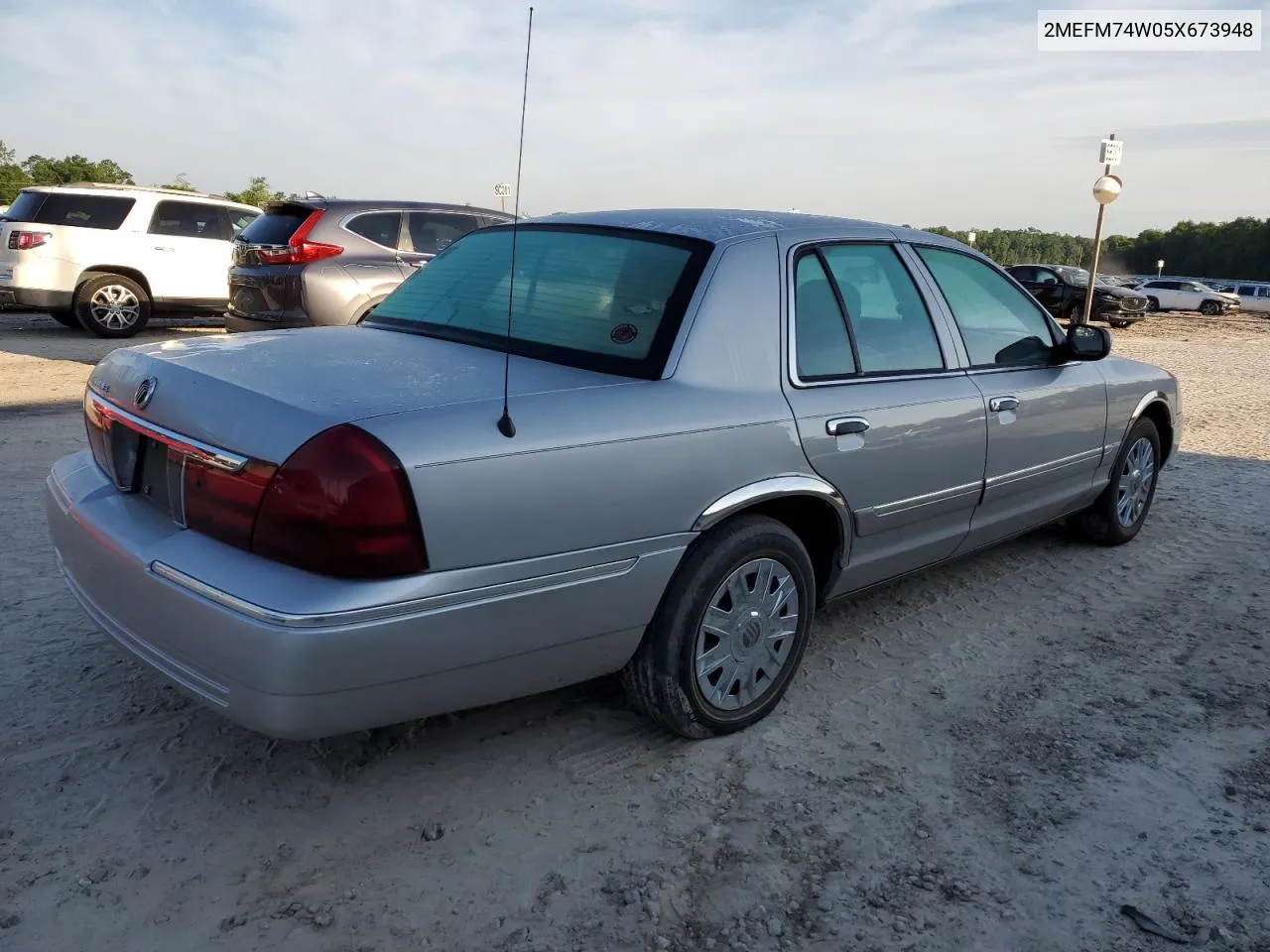 2005 Mercury Grand Marquis Gs VIN: 2MEFM74W05X673948 Lot: 54959124