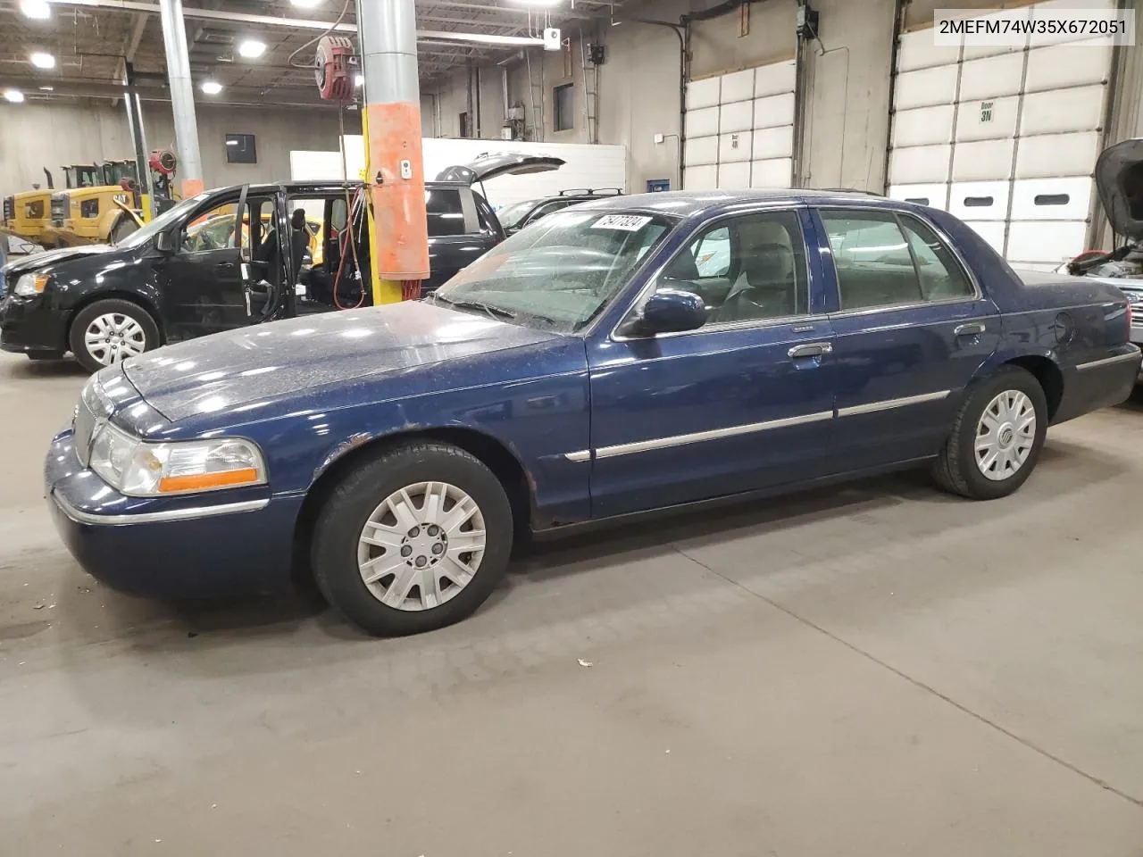 2005 Mercury Grand Marquis Gs VIN: 2MEFM74W35X672051 Lot: 75477324