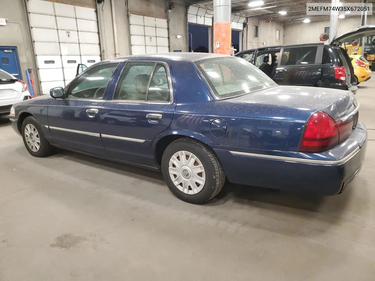 2005 Mercury Grand Marquis Gs VIN: 2MEFM74W35X672051 Lot: 75477324