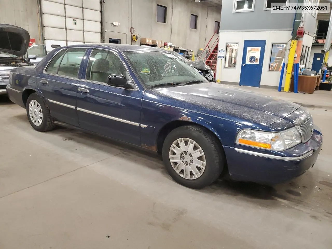 2005 Mercury Grand Marquis Gs VIN: 2MEFM74W35X672051 Lot: 75477324