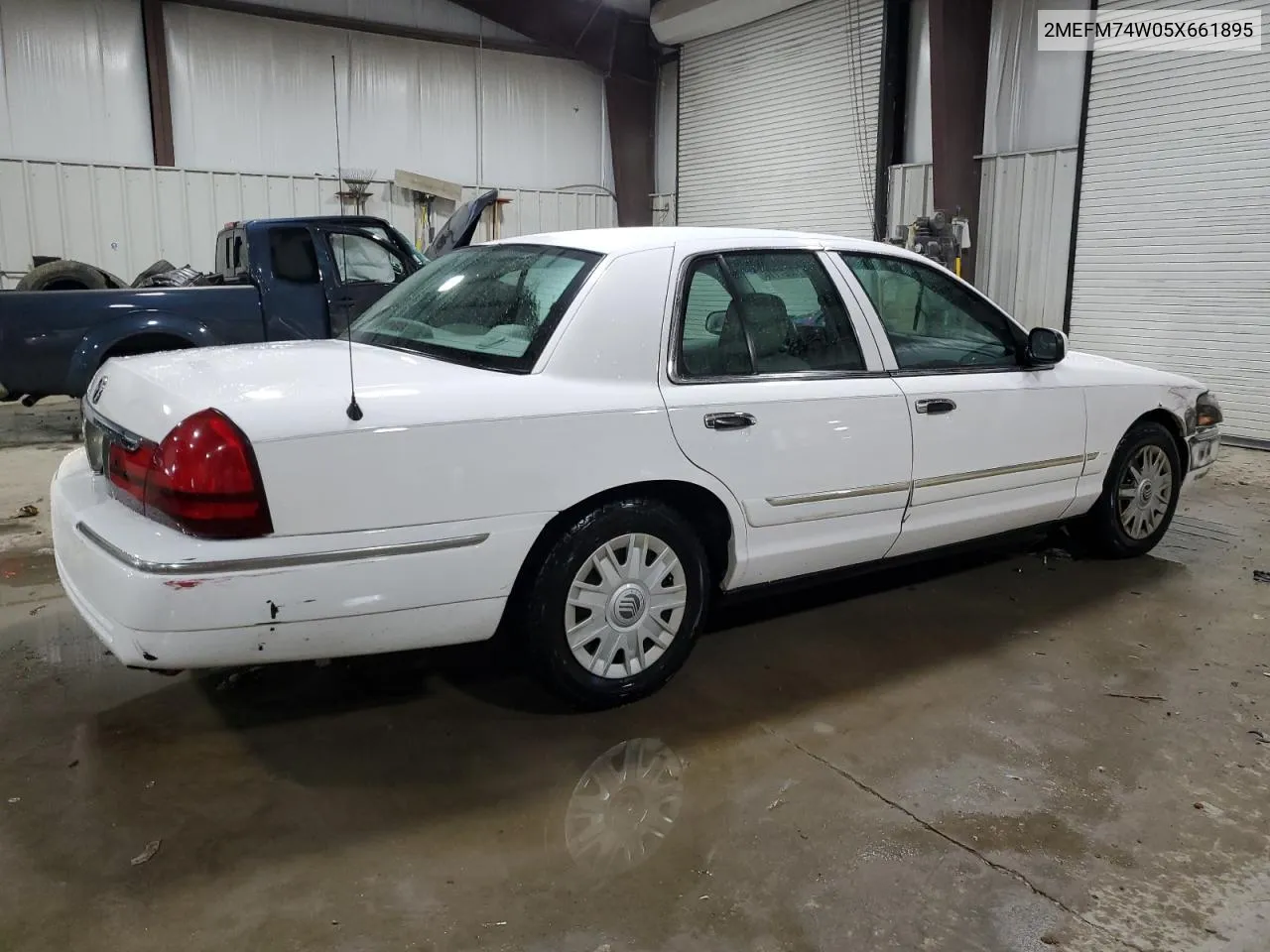 2005 Mercury Grand Marquis Gs VIN: 2MEFM74W05X661895 Lot: 75527114