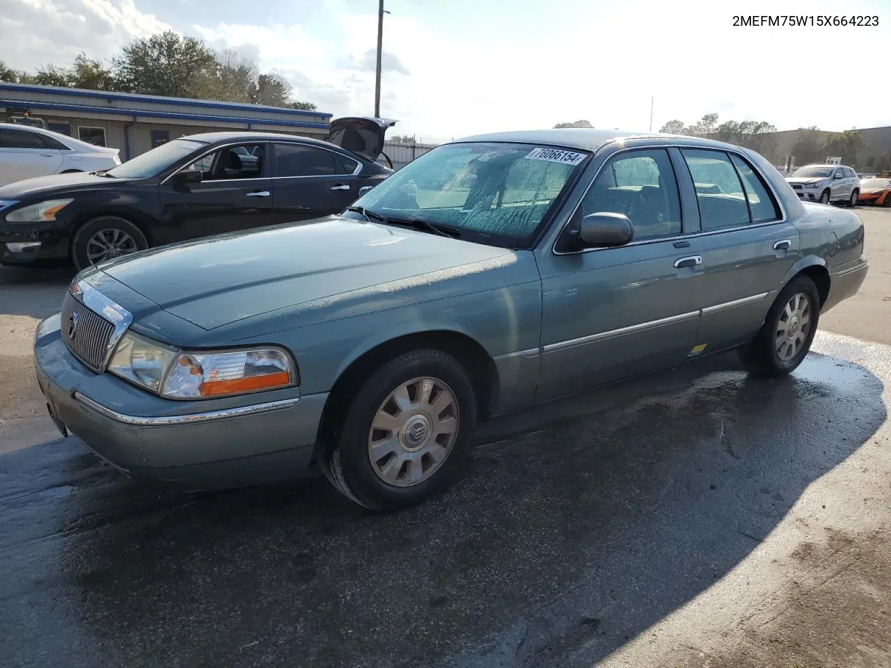 2005 Mercury Grand Marquis Ls VIN: 2MEFM75W15X664223 Lot: 76066154