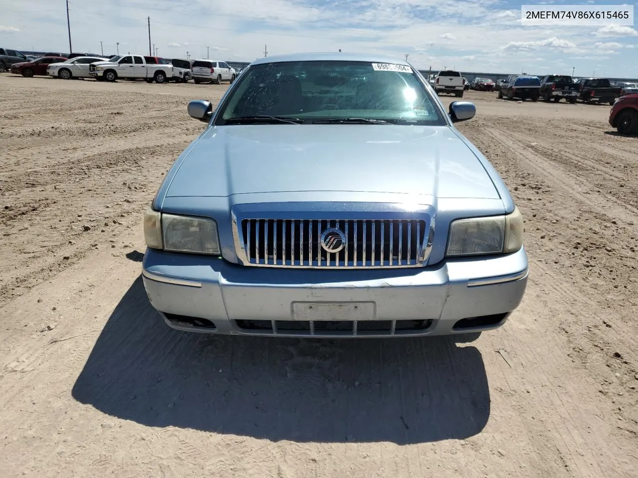 2006 Mercury Grand Marquis Gs VIN: 2MEFM74V86X615465 Lot: 69851504