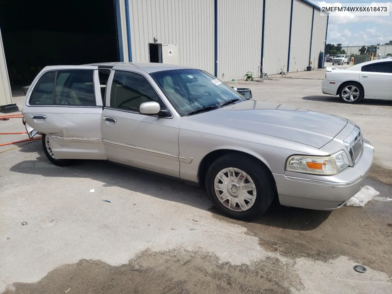 2006 Mercury Grand Marquis Gs VIN: 2MEFM74WX6X618473 Lot: 74459354