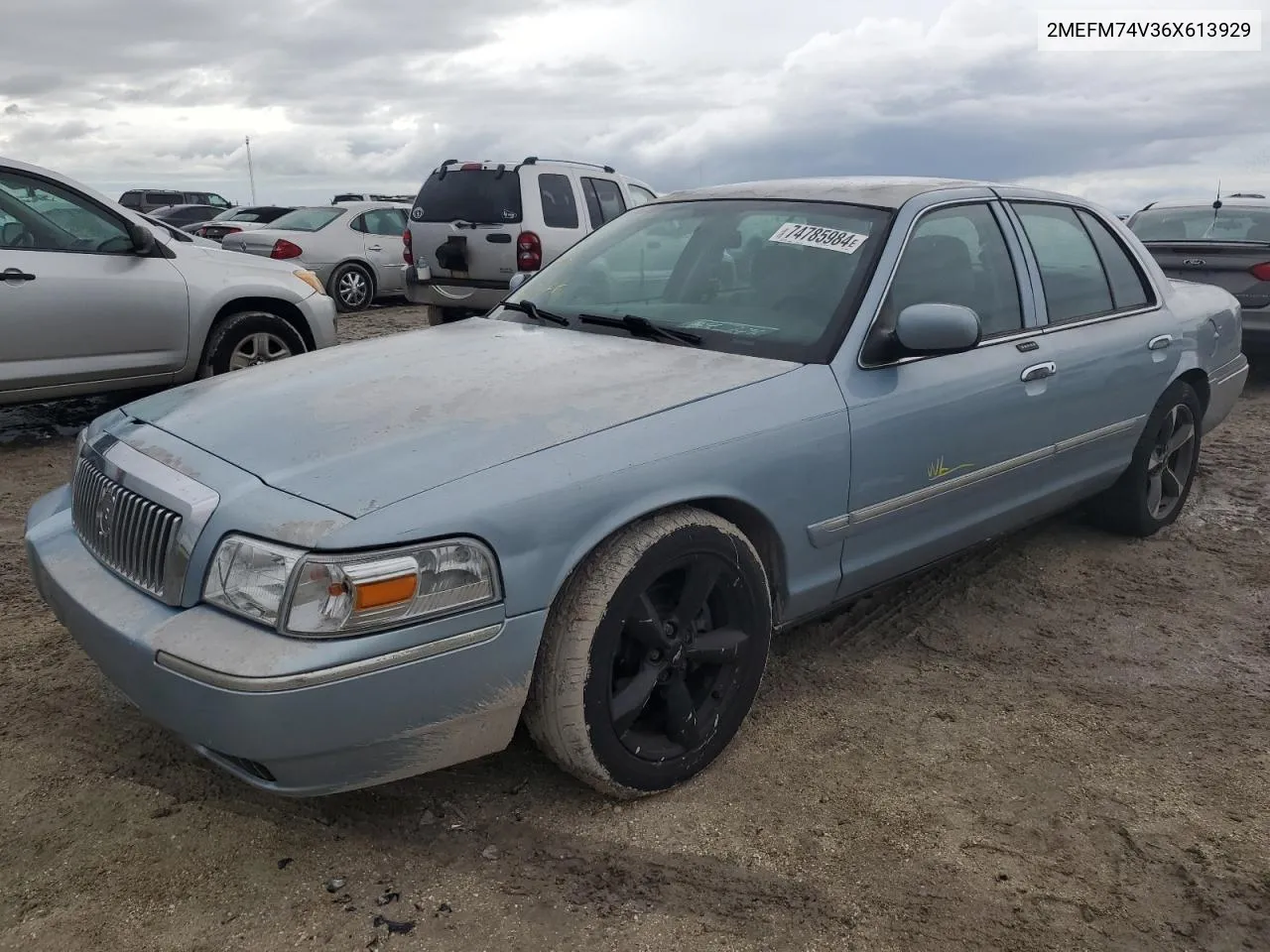 2006 Mercury Grand Marquis Gs VIN: 2MEFM74V36X613929 Lot: 74785984