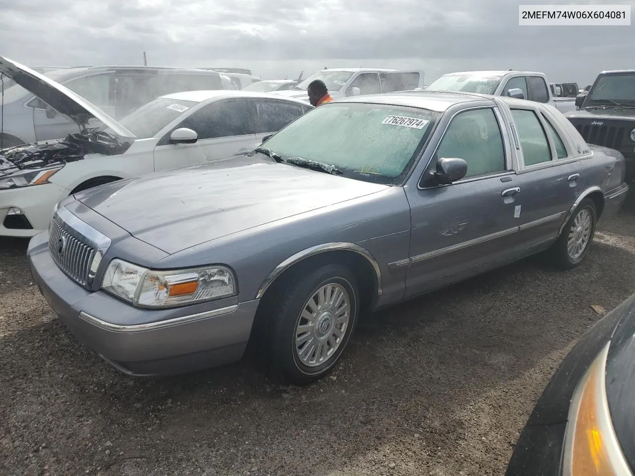 2006 Mercury Grand Marquis Gs VIN: 2MEFM74W06X604081 Lot: 76267974