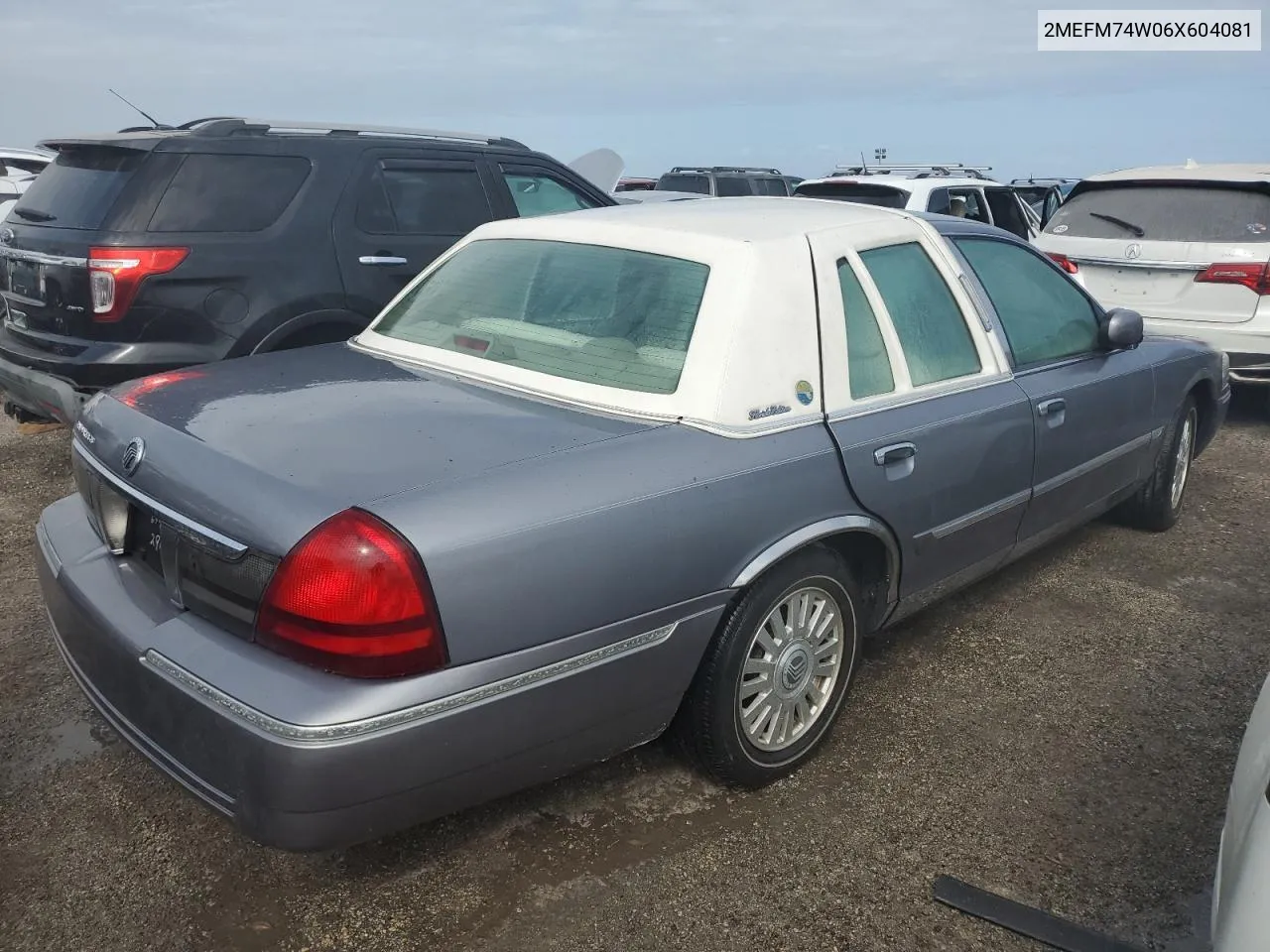 2006 Mercury Grand Marquis Gs VIN: 2MEFM74W06X604081 Lot: 76267974