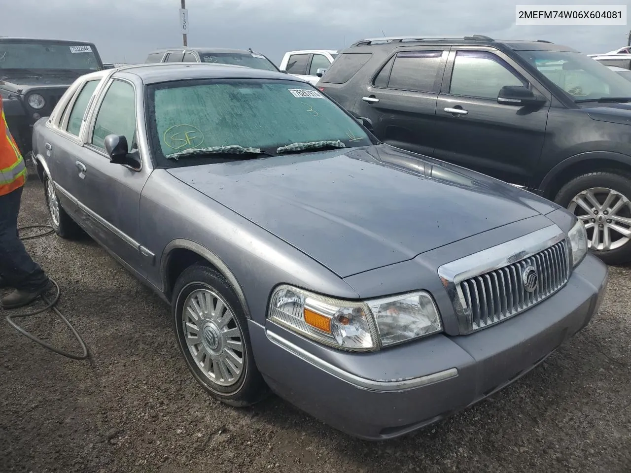 2006 Mercury Grand Marquis Gs VIN: 2MEFM74W06X604081 Lot: 76267974