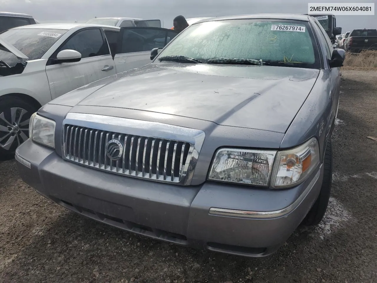 2006 Mercury Grand Marquis Gs VIN: 2MEFM74W06X604081 Lot: 76267974