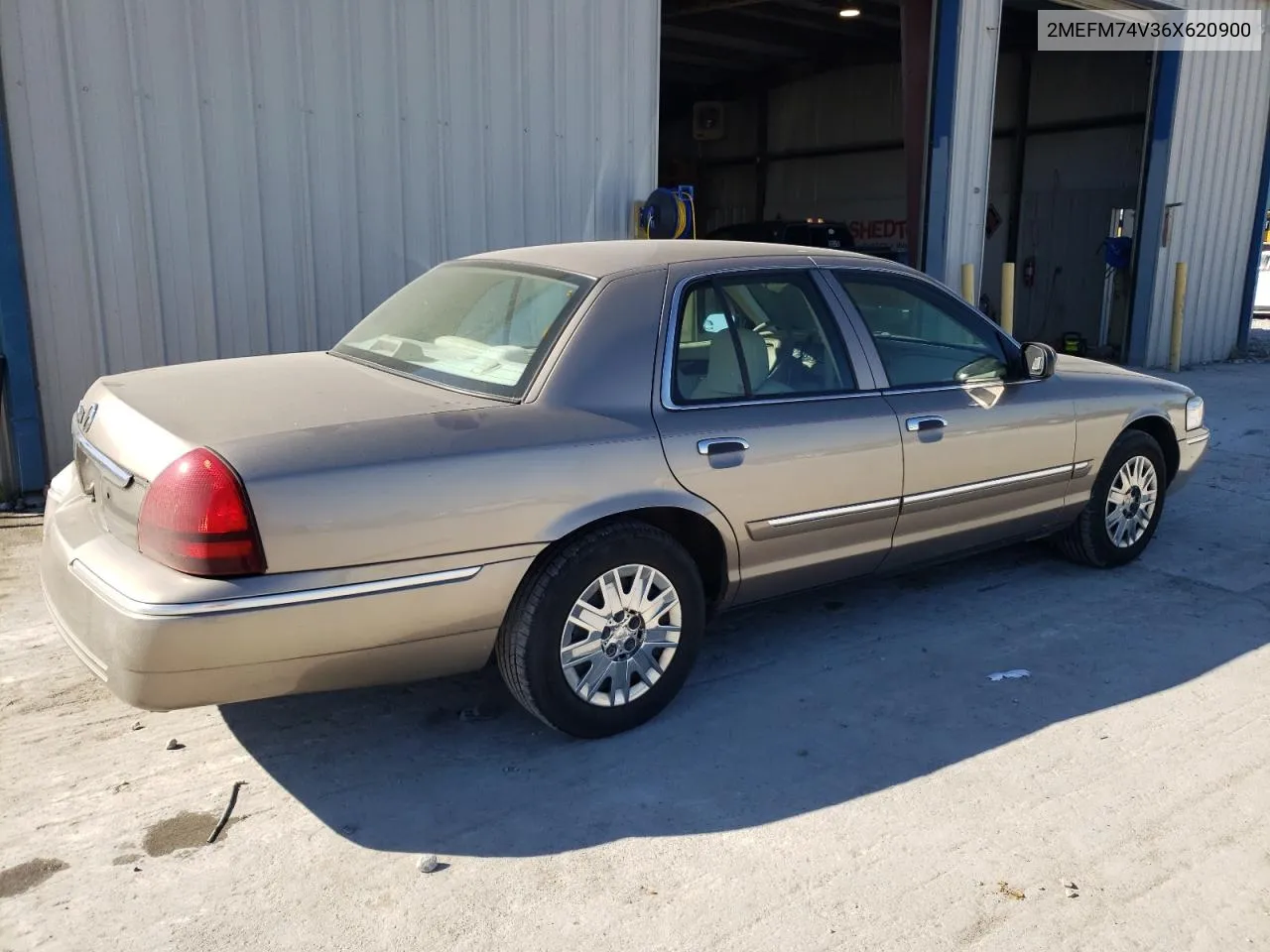 2006 Mercury Grand Marquis Gs VIN: 2MEFM74V36X620900 Lot: 76699624