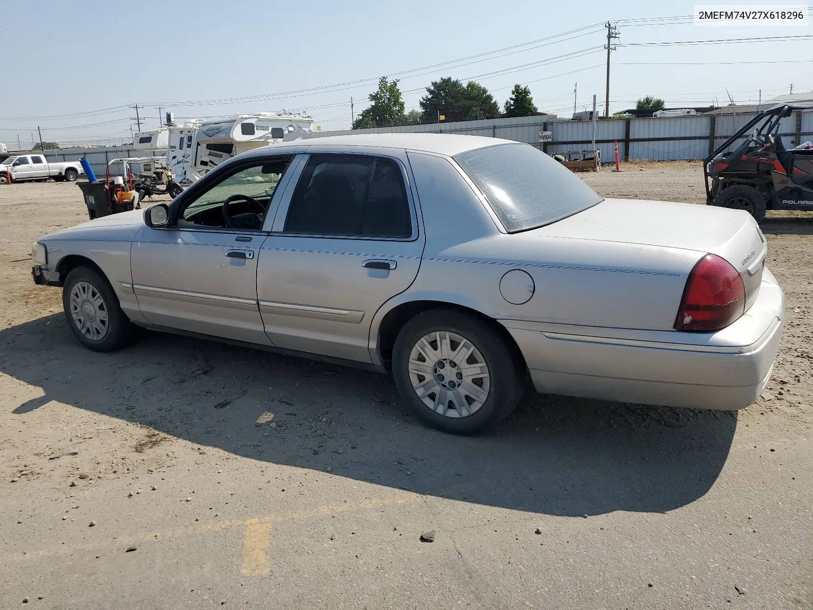 2007 Mercury Grand Marquis Gs VIN: 2MEFM74V27X618296 Lot: 64102024