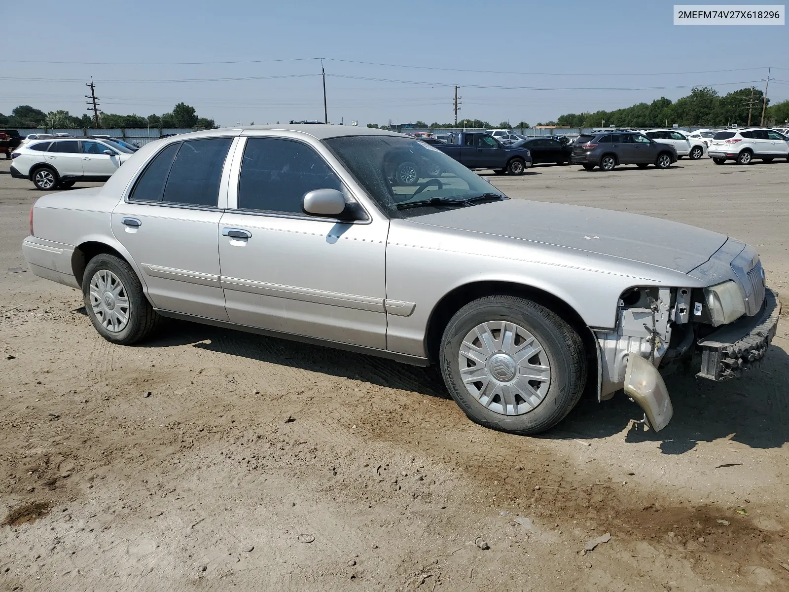 2007 Mercury Grand Marquis Gs VIN: 2MEFM74V27X618296 Lot: 64102024