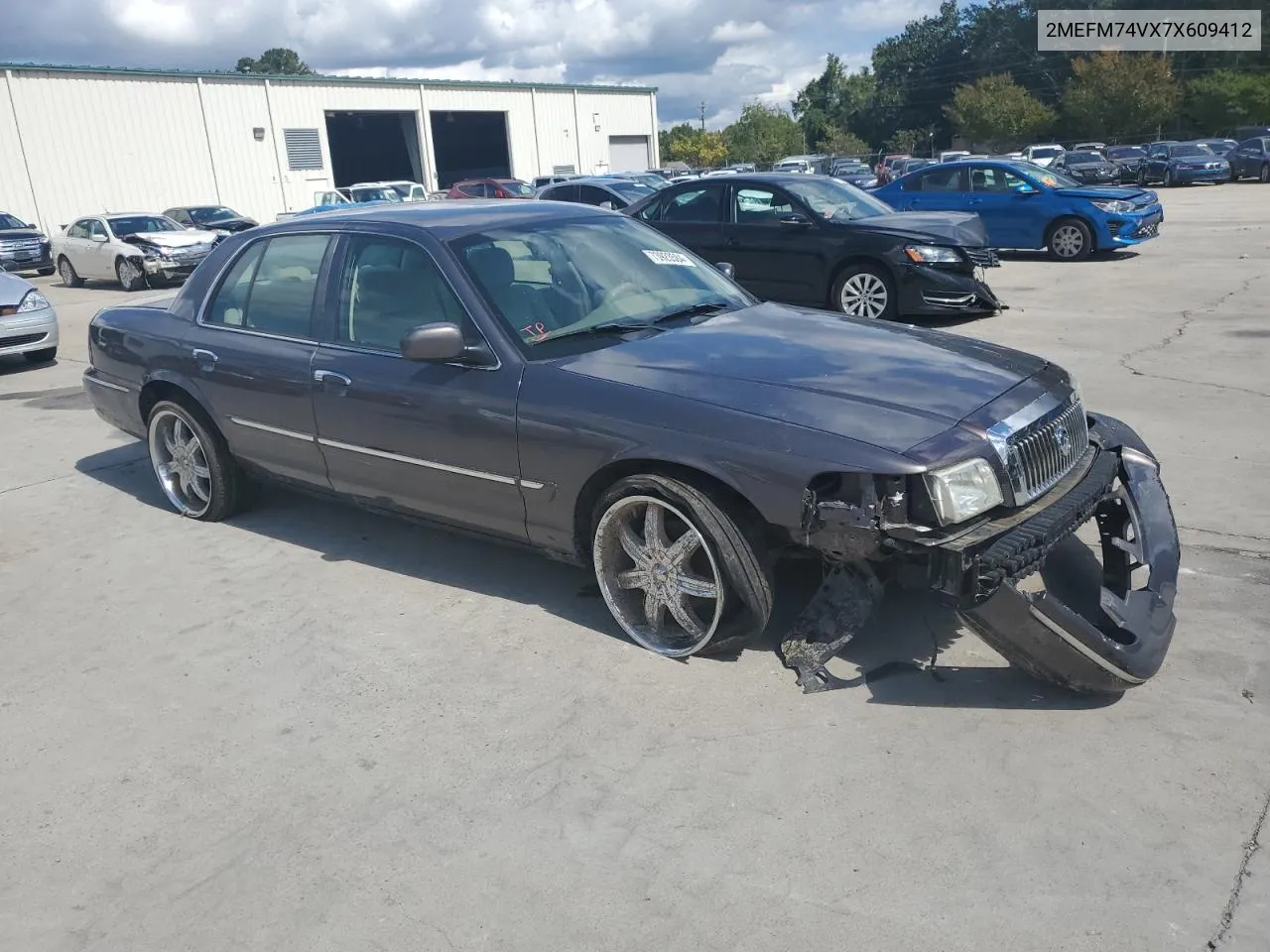 2007 Mercury Grand Marquis Gs VIN: 2MEFM74VX7X609412 Lot: 73923584