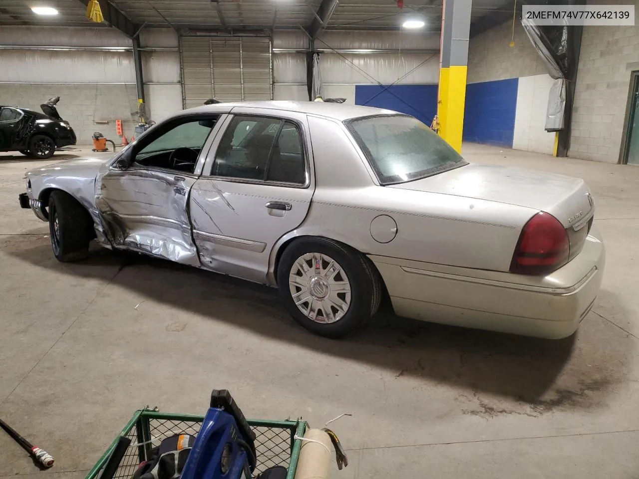 2007 Mercury Grand Marquis Gs VIN: 2MEFM74V77X642139 Lot: 77645214