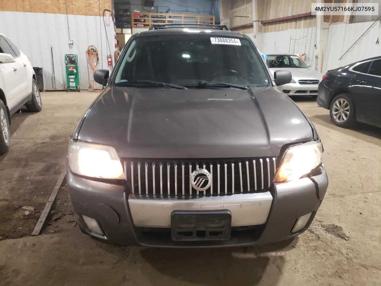 2006 Mercury Mariner VIN: 4M2YU57166KJ07595 Lot: 73888354