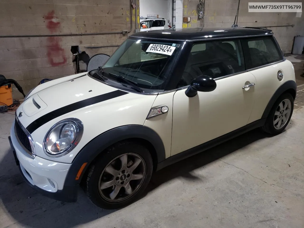 2009 Mini Cooper S VIN: WMWMF735X9TT96799 Lot: 69829424