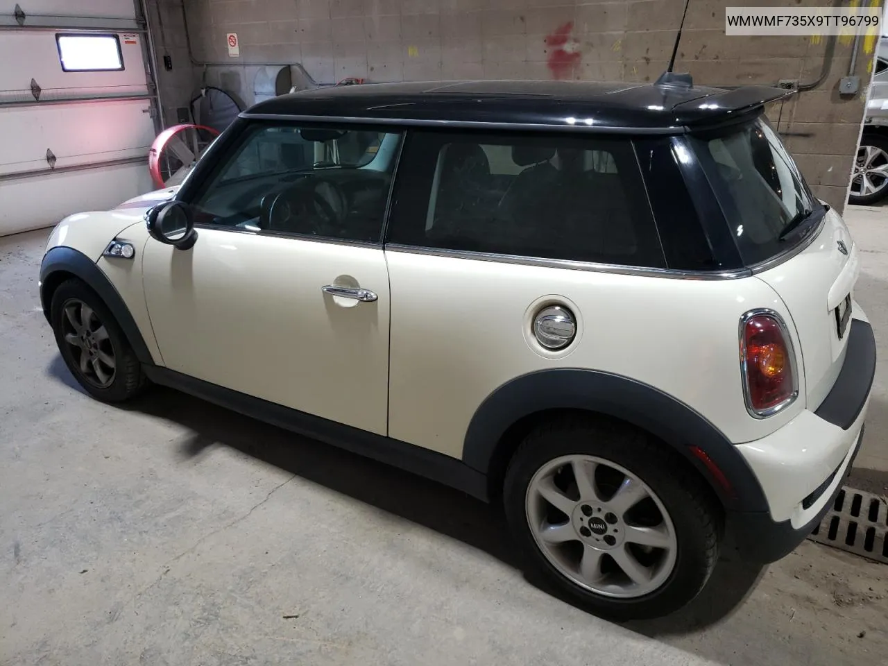 2009 Mini Cooper S VIN: WMWMF735X9TT96799 Lot: 69829424