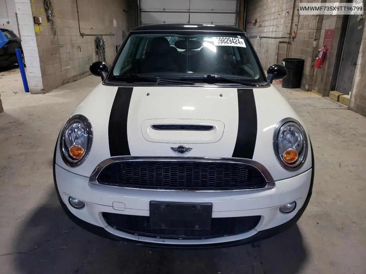 2009 Mini Cooper S VIN: WMWMF735X9TT96799 Lot: 69829424