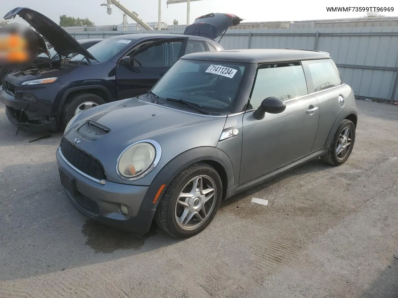 2009 Mini Cooper S VIN: WMWMF73599TT96969 Lot: 71411234