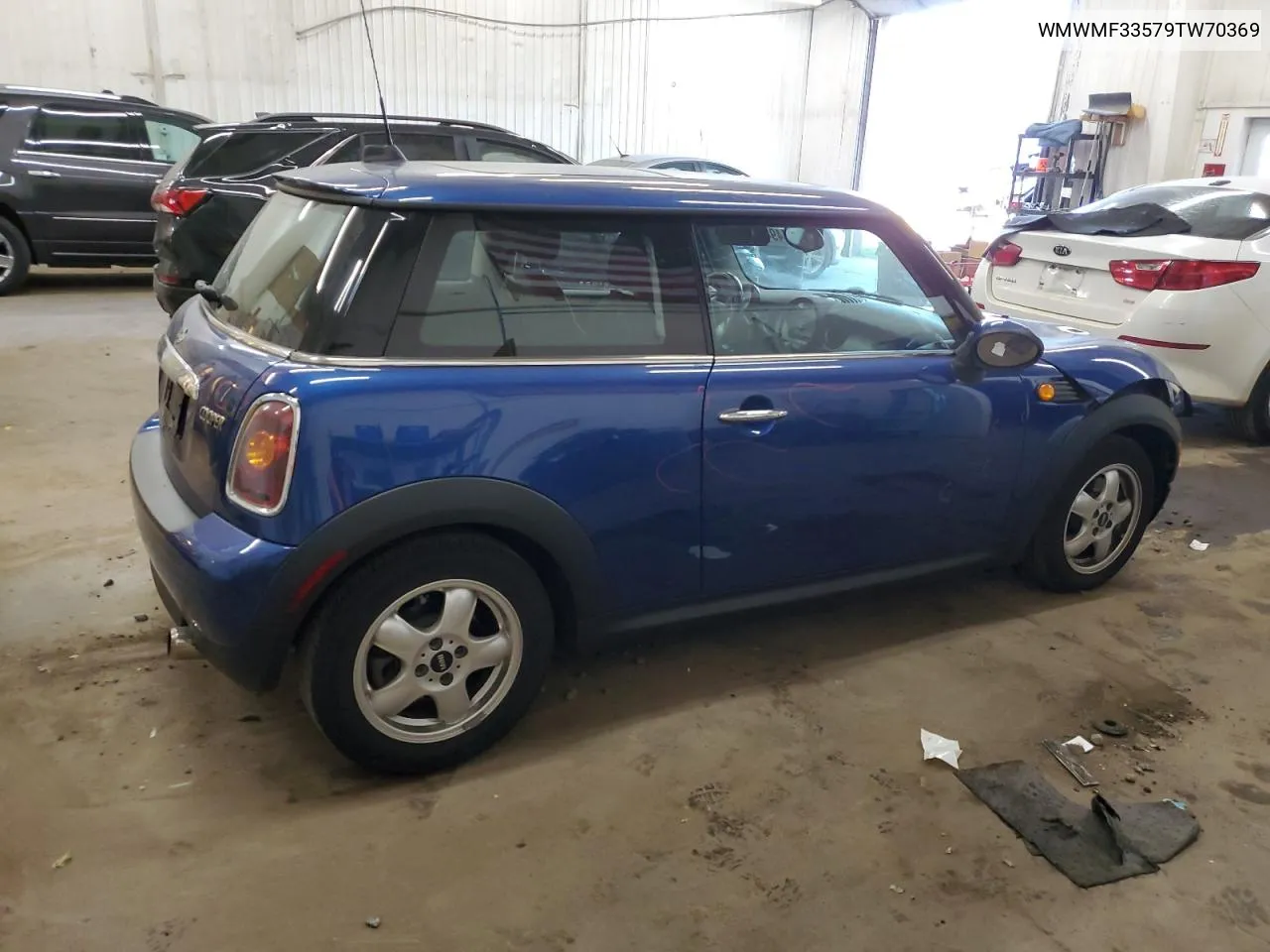 2009 Mini Cooper VIN: WMWMF33579TW70369 Lot: 74941174