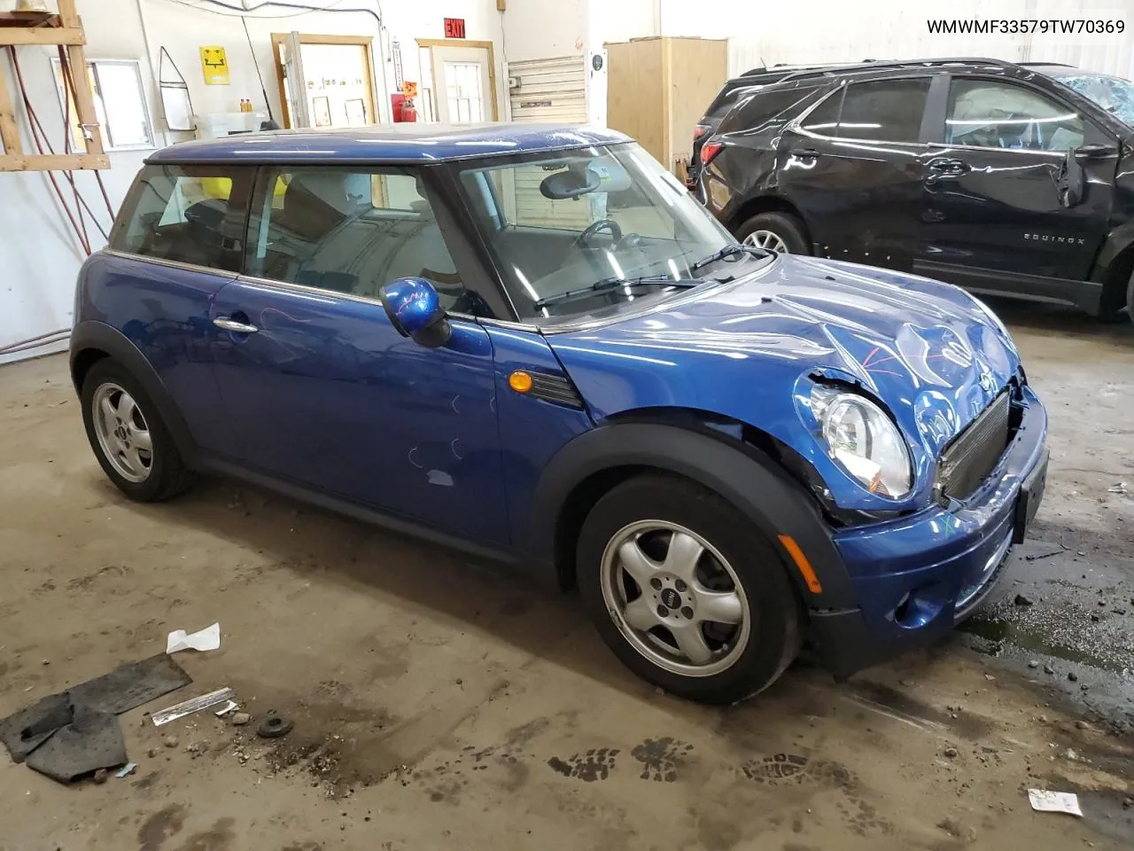 2009 Mini Cooper VIN: WMWMF33579TW70369 Lot: 74941174