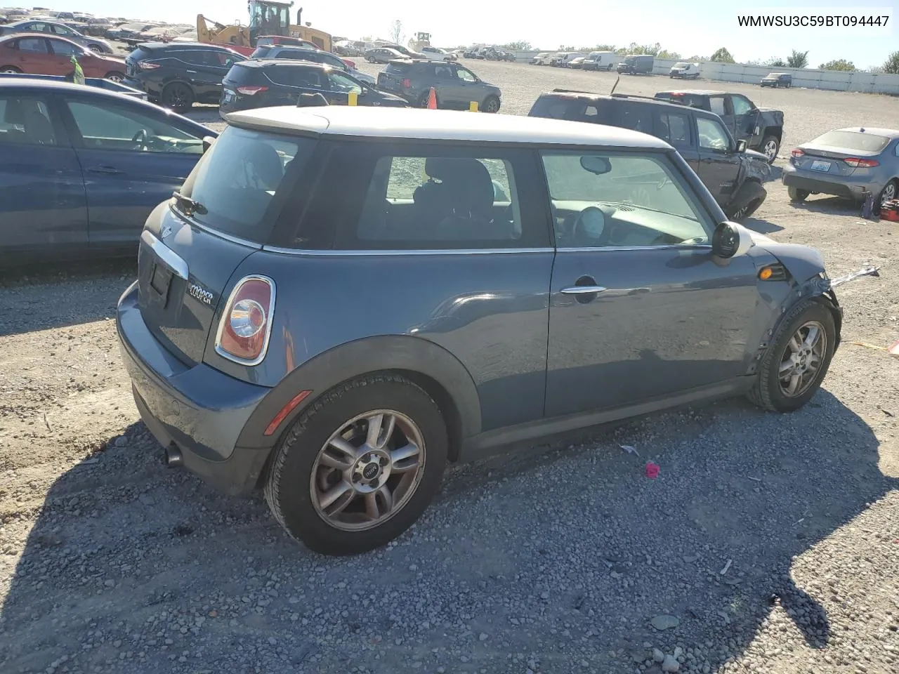 2011 Mini Cooper VIN: WMWSU3C59BT094447 Lot: 74190144