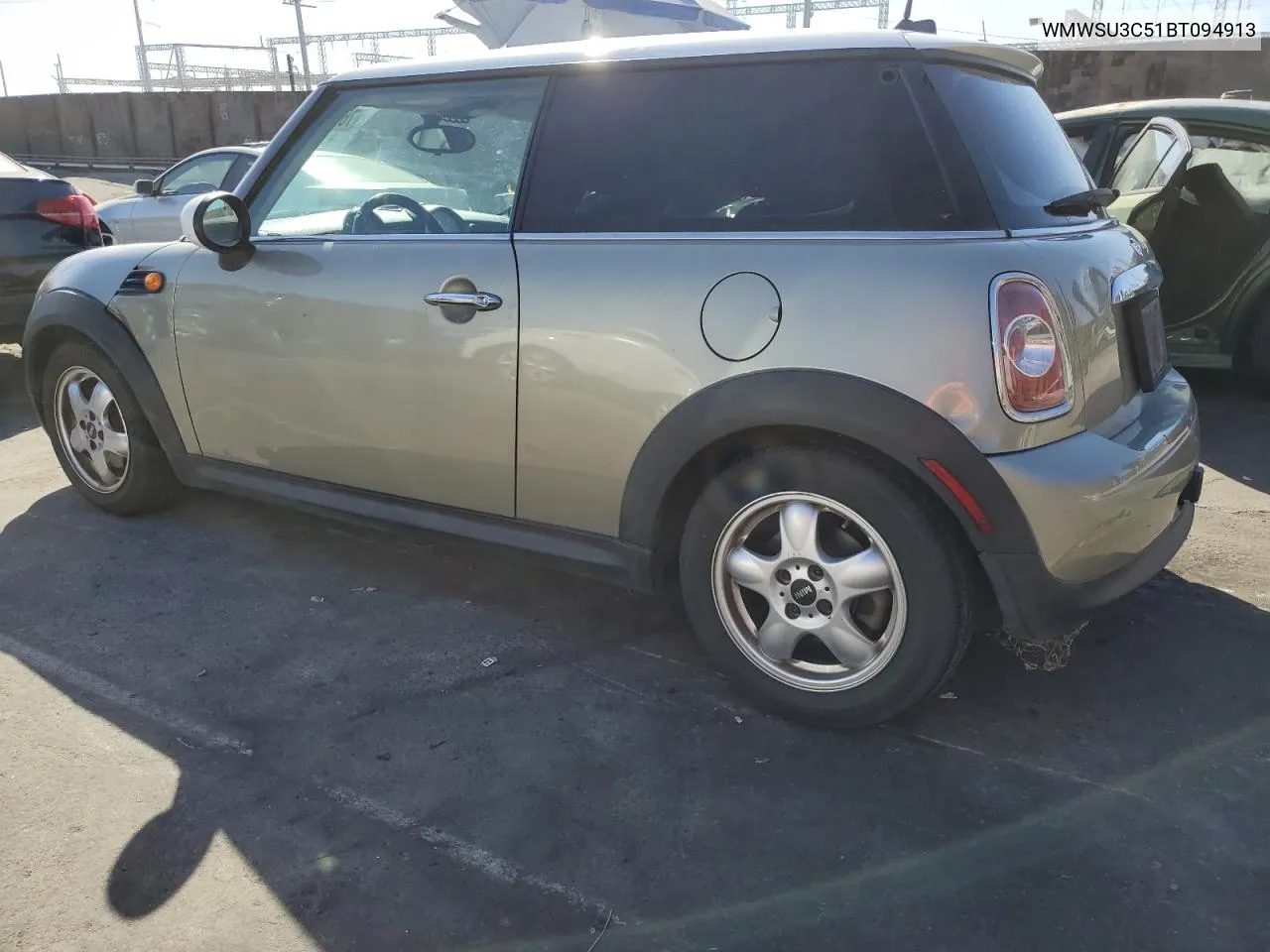 2011 Mini Cooper VIN: WMWSU3C51BT094913 Lot: 76789054