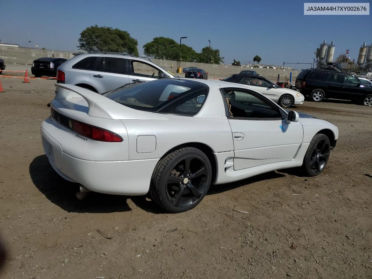 1999 Mitsubishi 3000 Gt VIN: JA3AM44H7XY002676 Lot: 59484634