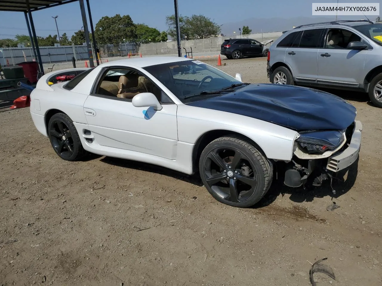 1999 Mitsubishi 3000 Gt VIN: JA3AM44H7XY002676 Lot: 59484634