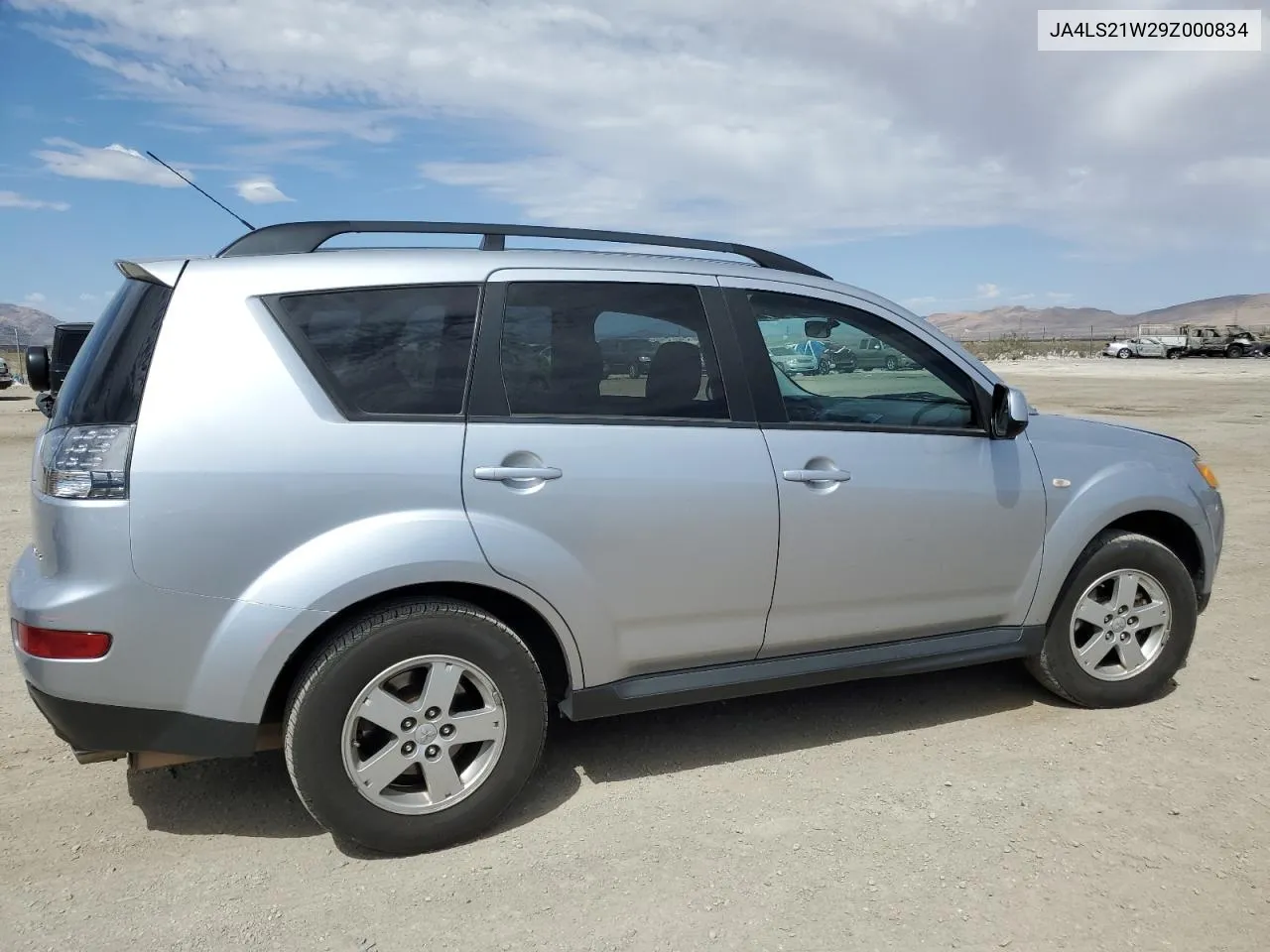 2009 Mitsubishi Outlander Es VIN: JA4LS21W29Z000834 Lot: 69220934