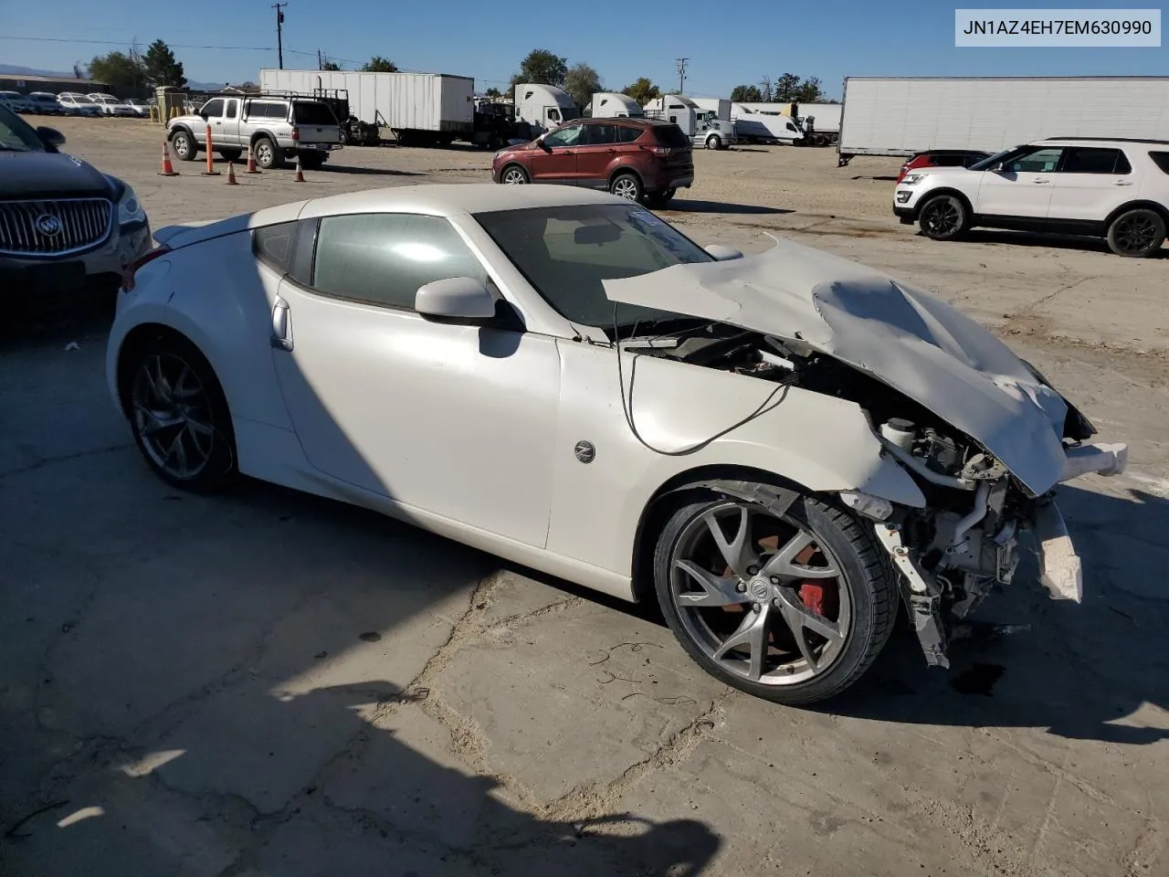 2014 Nissan 370Z Base VIN: JN1AZ4EH7EM630990 Lot: 77811544