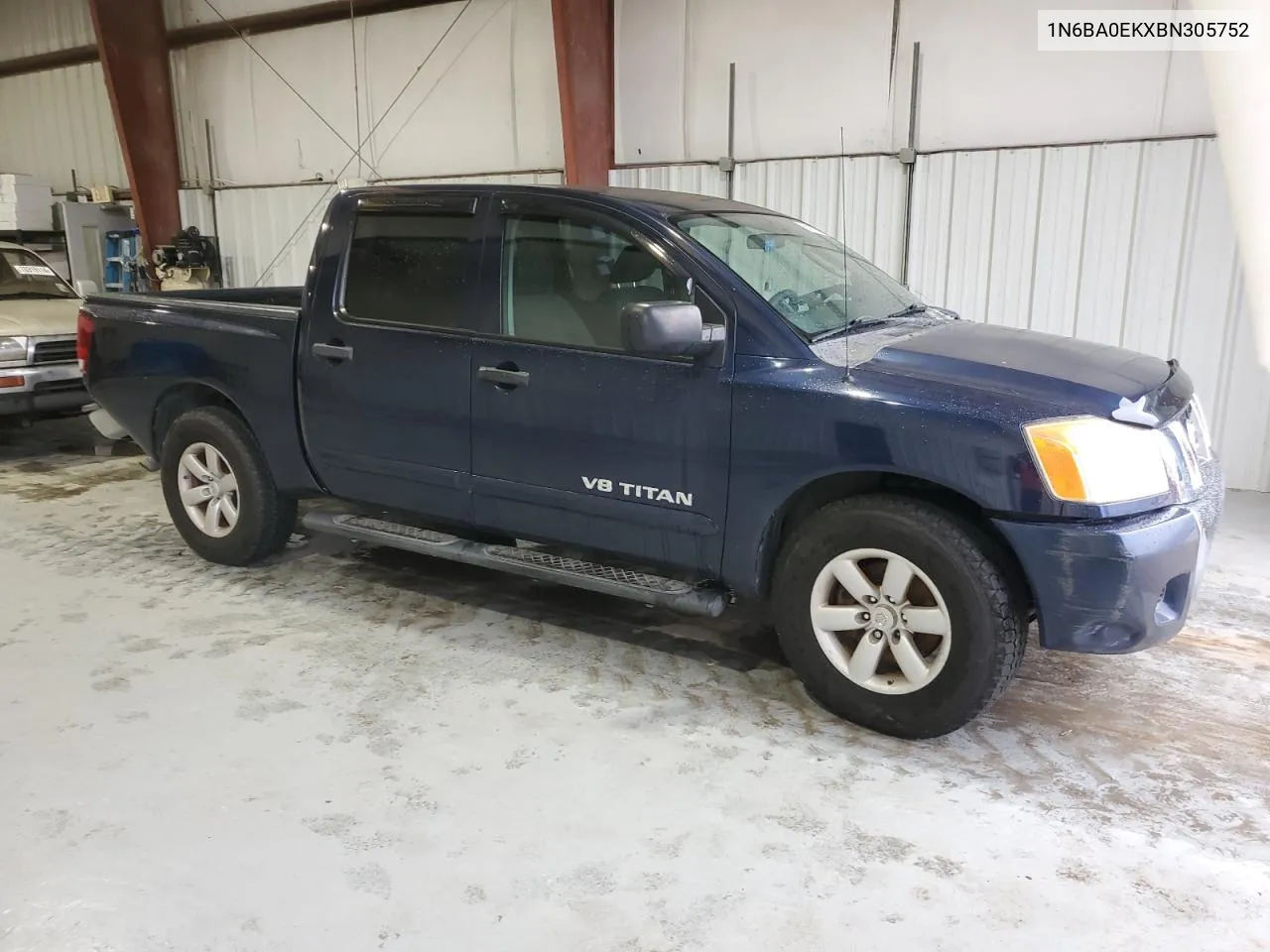 2011 Nissan Titan S VIN: 1N6BA0EKXBN305752 Lot: 69705974