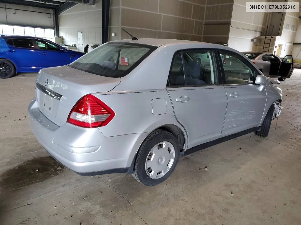 2009 Nissan Versa S VIN: 3N1BC11E79L352916 Lot: 72369534