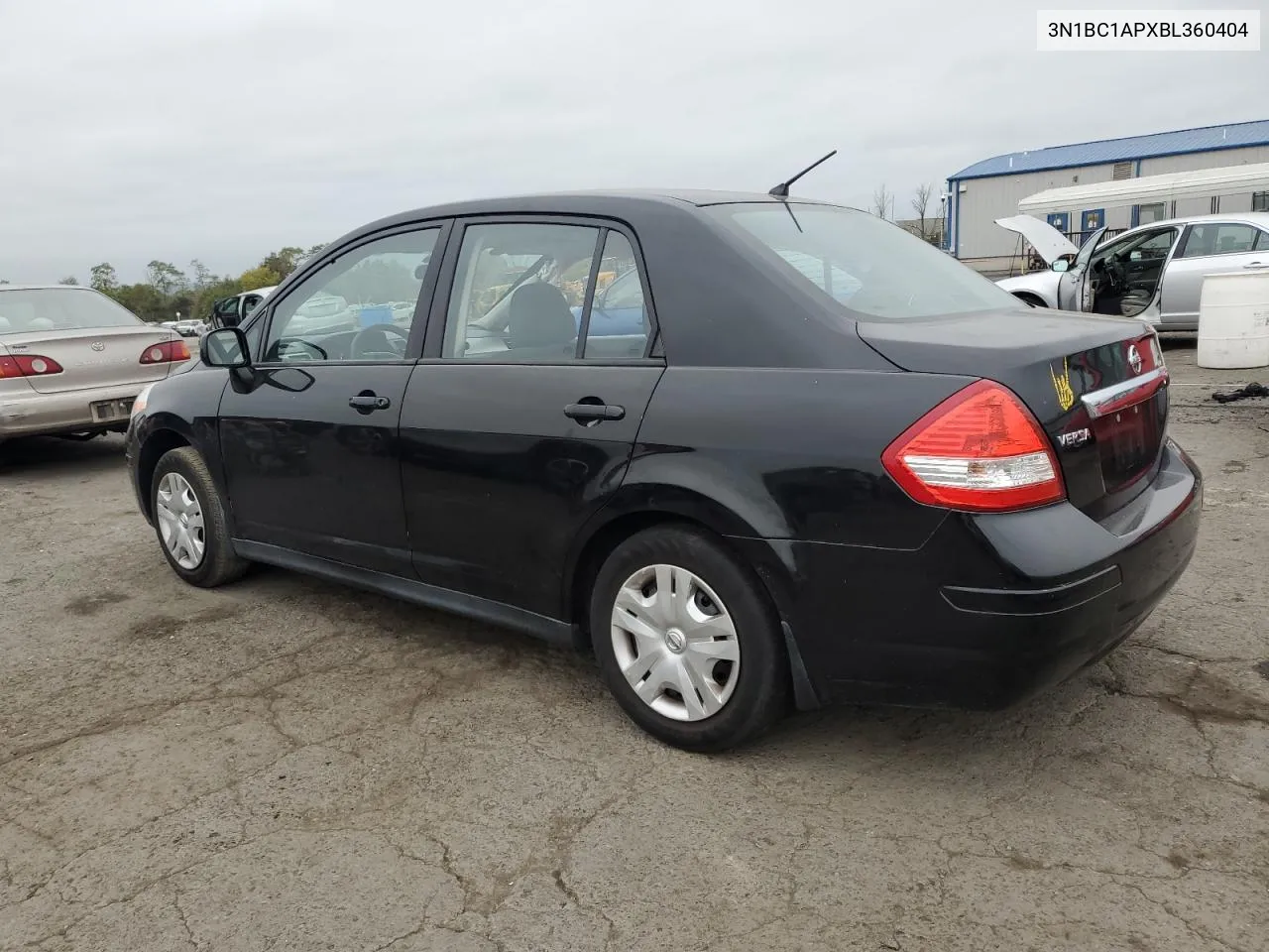 2011 Nissan Versa S VIN: 3N1BC1APXBL360404 Lot: 72826864