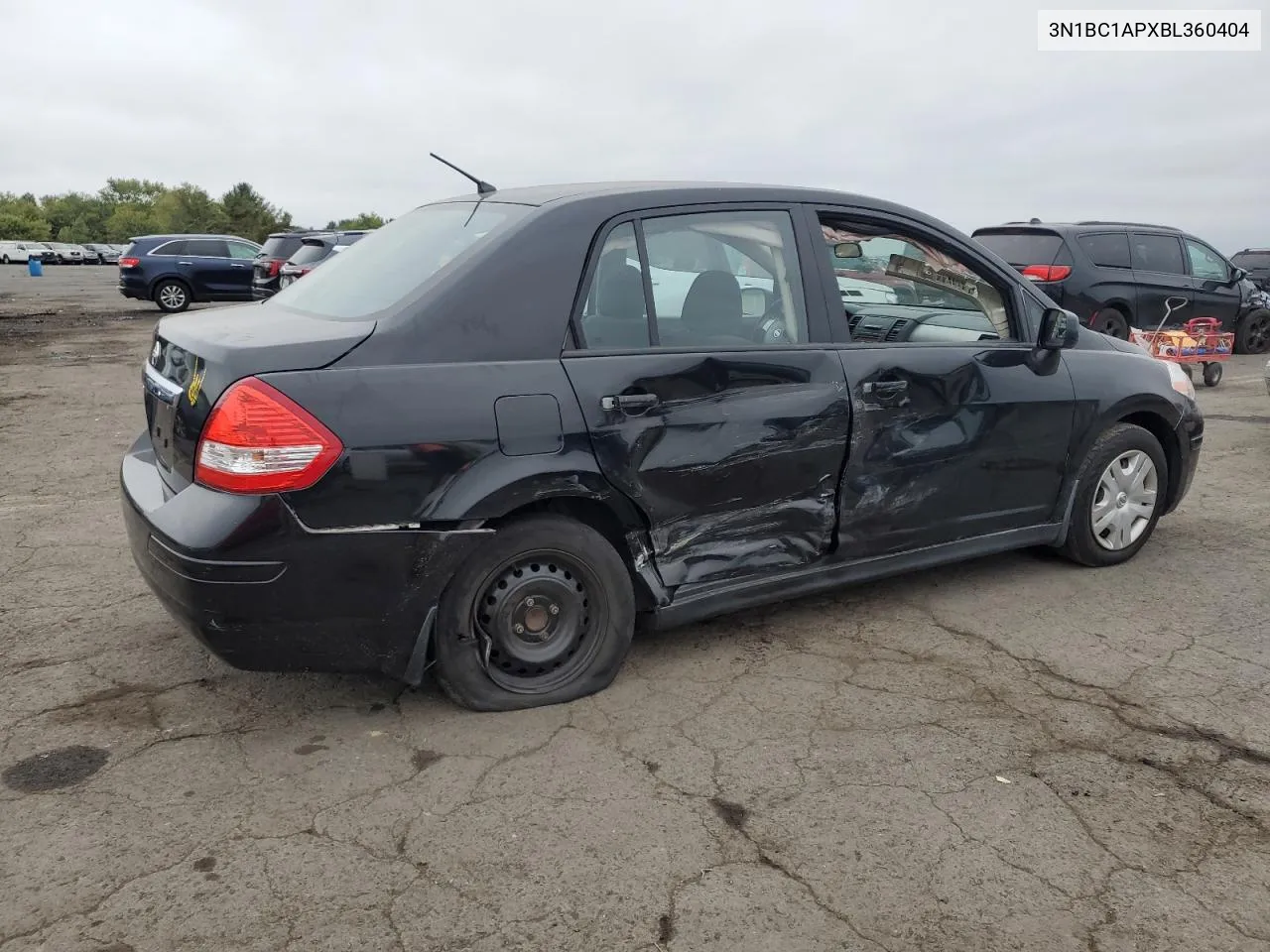 2011 Nissan Versa S VIN: 3N1BC1APXBL360404 Lot: 72826864